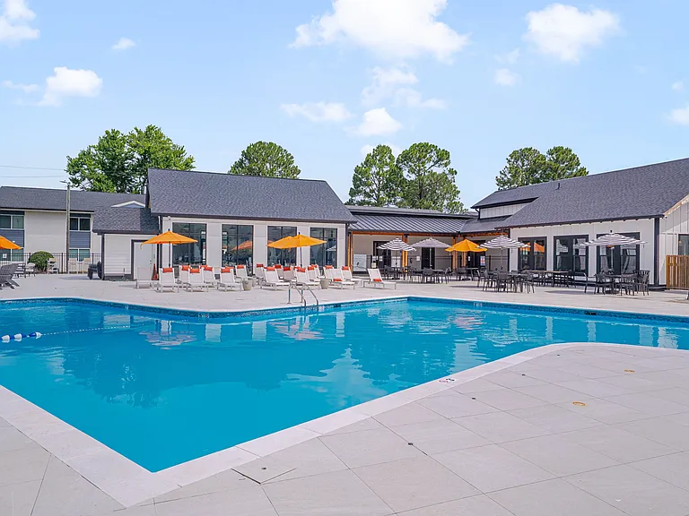 Relax in style at Crossings @ 501 Apartments, where a stunning pool and inviting lounge area await you. Soak up the sun on our spacious deck or gather with friends for a fun day by the water. Make it yours today!