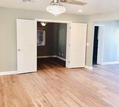 A better photo looking into the den. To the right of that is the door to the laundry room which also has lots of cabinet and storage space.