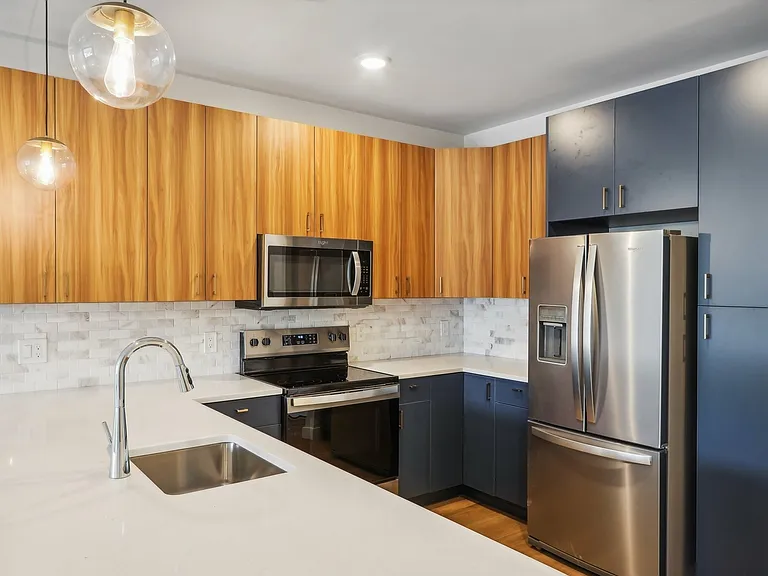The Oak Floor Plan Corner Kitchen with Ample Counter Space