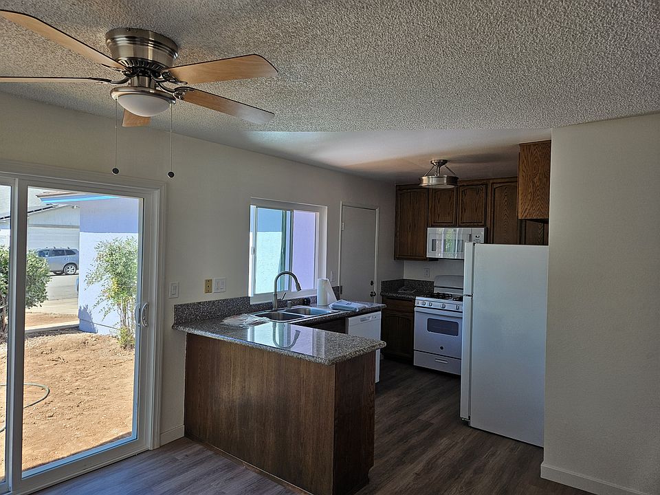 Newly redone kitchen, floors, front outside patio