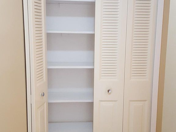 Lots of storage. Fresh paint on shelves. 