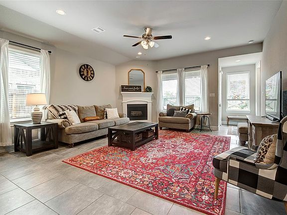 19x17 Family - Lots of windows mean that every day is bright and cheerful with a view of the back yard. A fire in the fireplace will take the chill out of a cold day and gives a great focal point to the room.