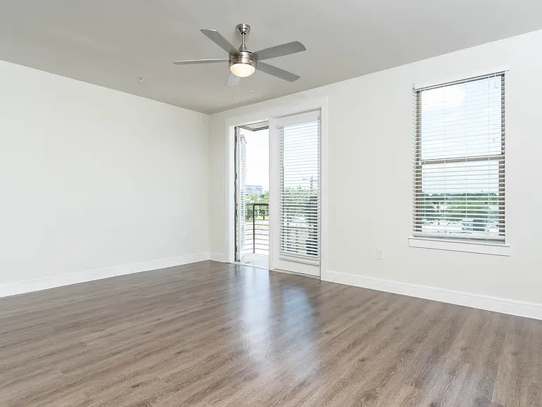 Living Room with Balcony and Hard Surface Flooring
