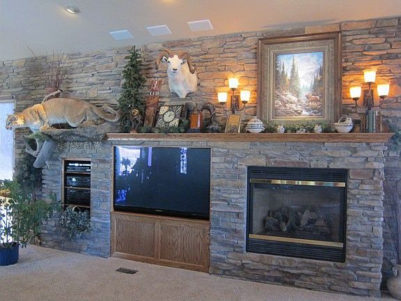 STONE WALL WITH FIREPLACE