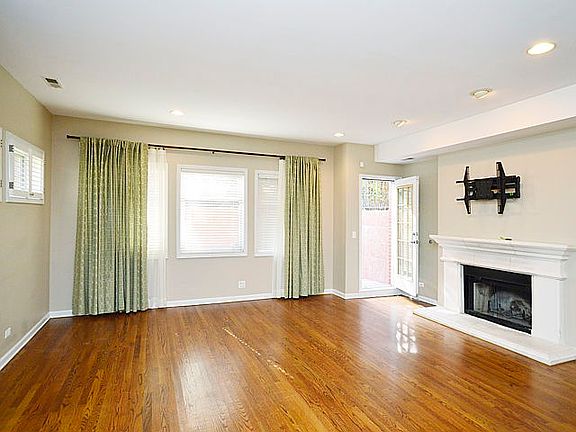 Lovely & Spacious Living Room that Opens to Private Patio