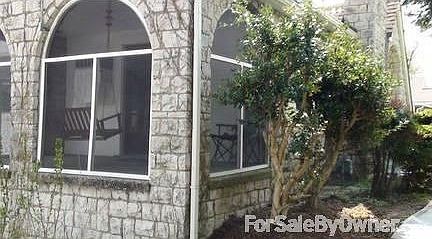 Side View of Arched Screened Porch
						:
						Side View of Arched Screened In Porch