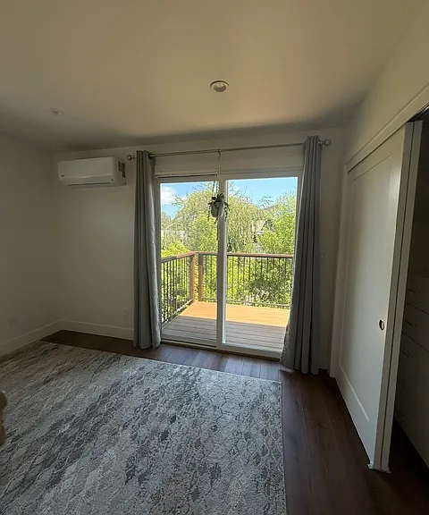 2nd bedroom with slider to deck area