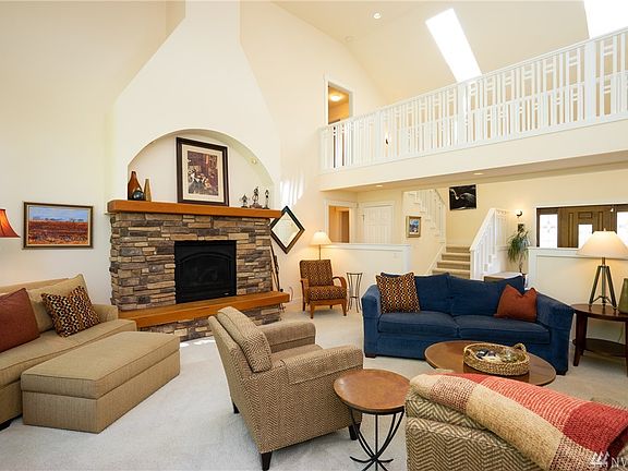 Living room from another angle with skywalk and entry in background