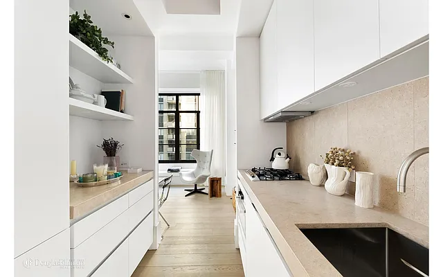 Sold by Douglas Elliman | media 13