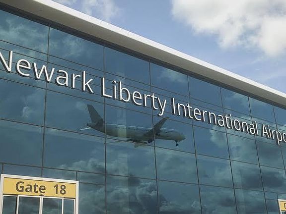 Non-residential airport terminal exterior with glass facade and entry signage; not a rentable home or room space.