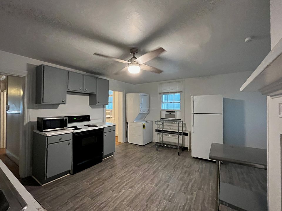 Kitchen with washer and dryer