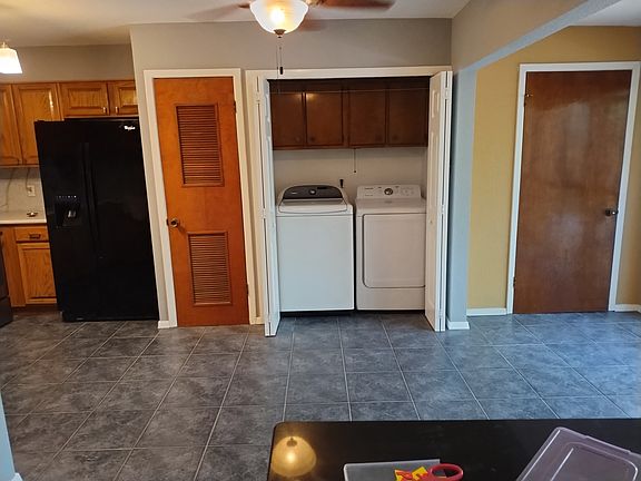 Washer and dryer off kitchen