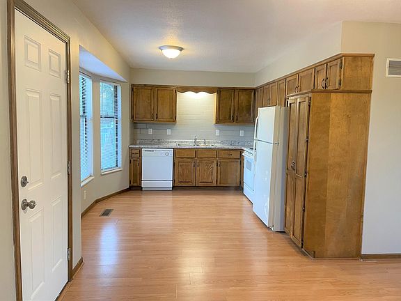 Spacious Kitchen with door to balcony