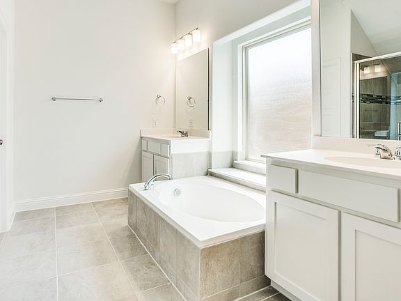 Split vanities in owner s bath