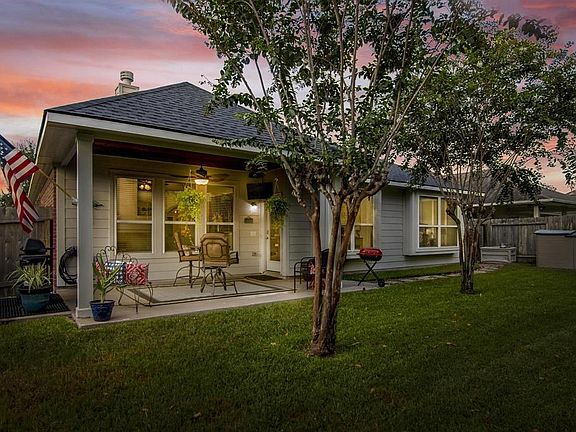 Enjoy the integrated, professionally installed 16x12 covered patio including 1x6 stained, tongue and groove knotty pine ceiling with TV wiring, recessed cans, new (2020) fan and light and still room for a pool!