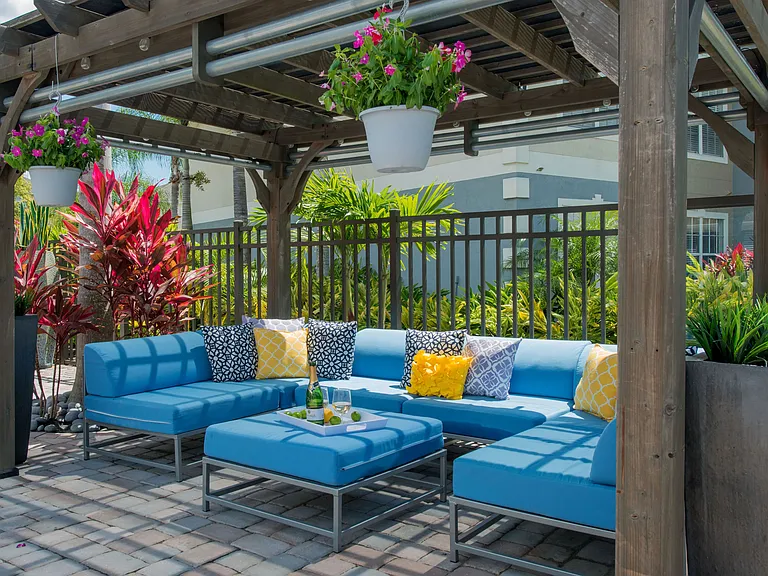 Unwind in shaded comfort and enjoy beautiful lake views under our inviting poolside pergolas, offering a luxe escape for relaxation.