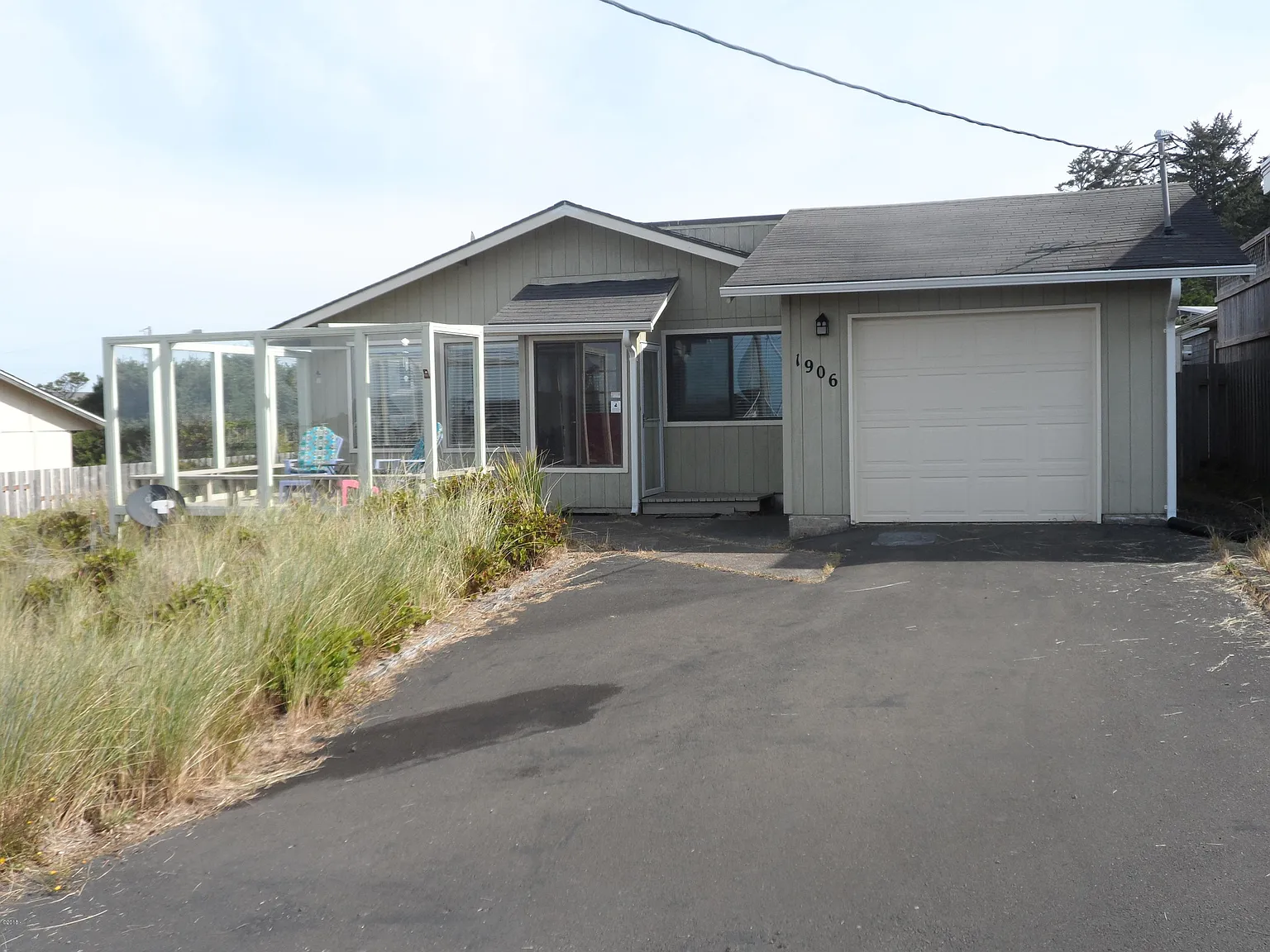 1906 NW Coracle St photo 1