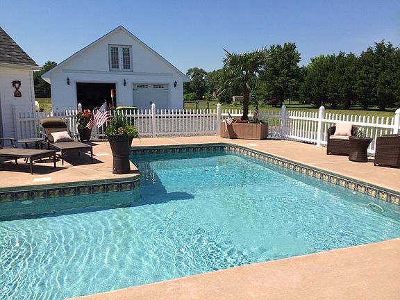 In ground pool & garage