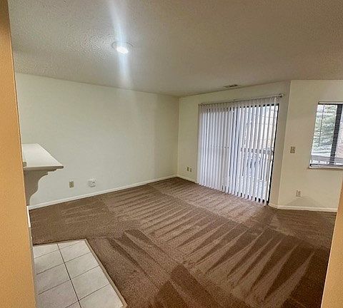View of living room from laundry room doorway