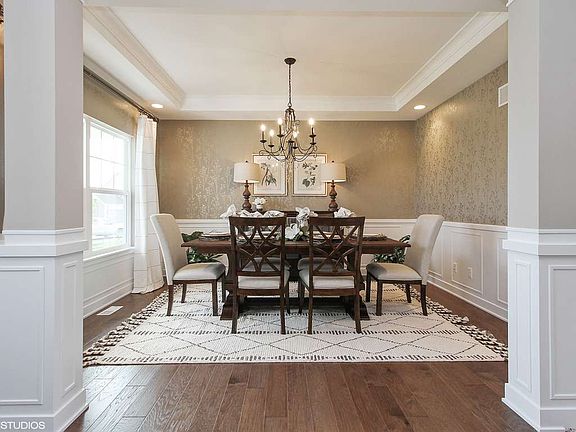 Beautiful architectural features such as, wainscoting, columns, tray ceiling.