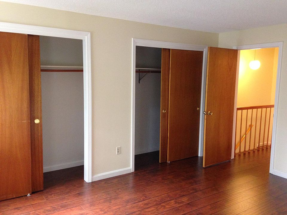 bedroom 1 with he and she closet