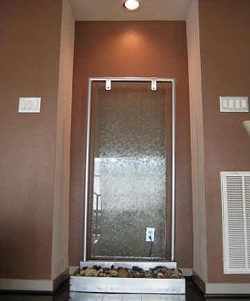 Art niche at the top of stairs - custom waterwall