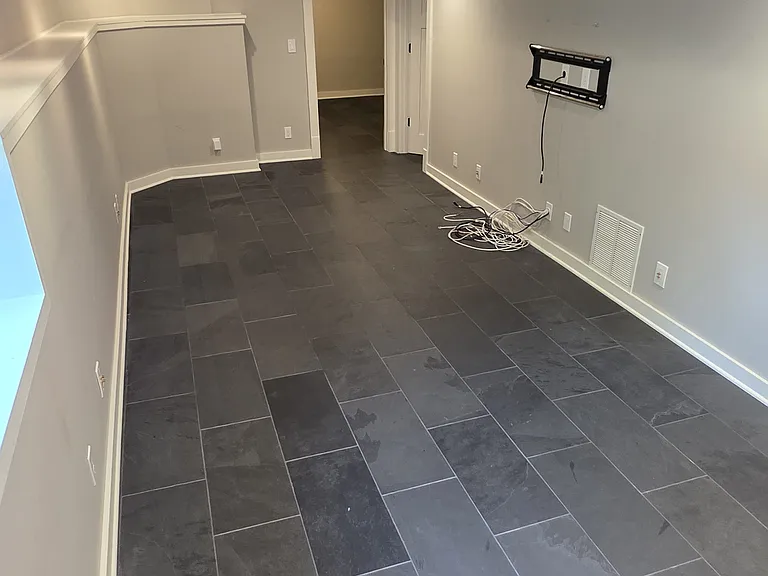 Basement open area around corner from stair case