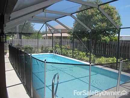 Rear View
						:
						Solar Heated Swimming Pool recently remarsited.