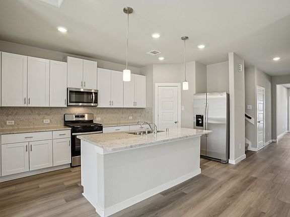 The Somerville plan in Pine Lake Cove of Conroe, TX.