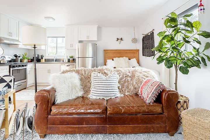 Bright, open 500-sf detached studio ADU with sleeping area, full kitchen, and living space