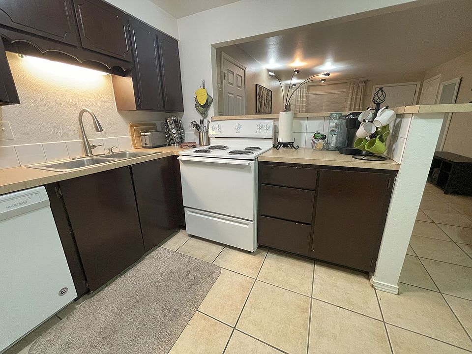 Kitchen with Tile Floors, Refrigerator, Range Oven, Dishwasher