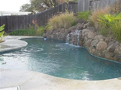 Custom Built-In Pool With Waterfall