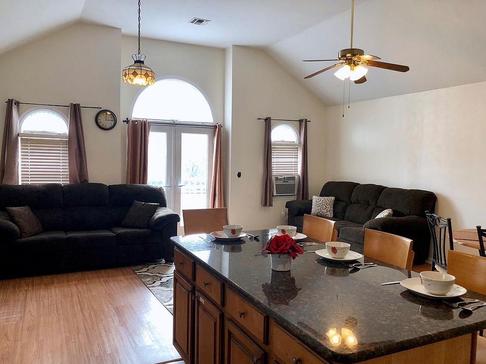 Open Concept Kitchen and living room - Two sofa cum bed full size