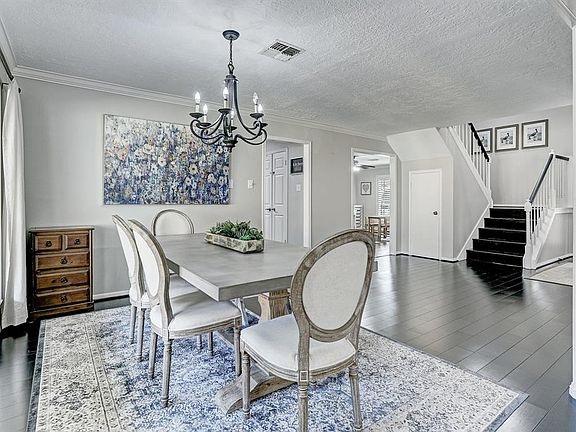 Lovely dining room with wonderful view of the backyard.