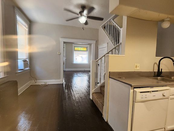 Kitchen looking forward to dining area and living room