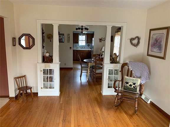 Dining room has built-in curio cabinets.