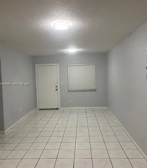 2390 W 74th St #202 — Photo 1