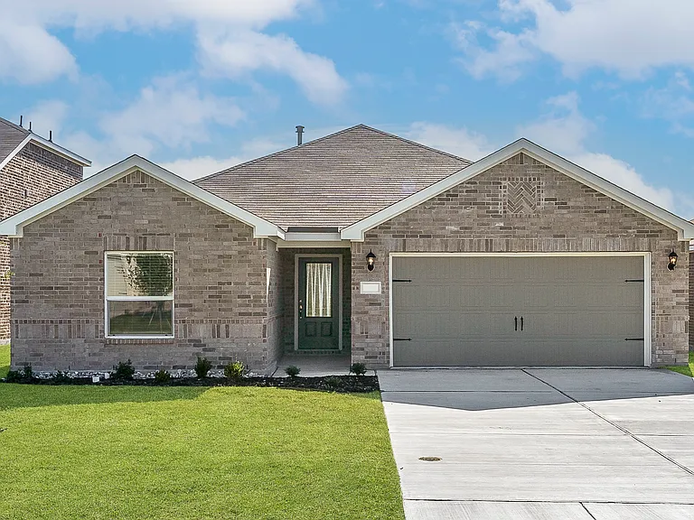 The Sabine is a beautiful one-story floor plan with a brick exterior.