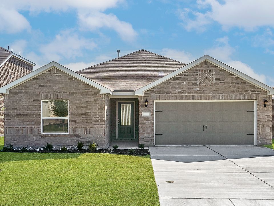 The Sabine is a beautiful one-story floor plan with a brick exterior.