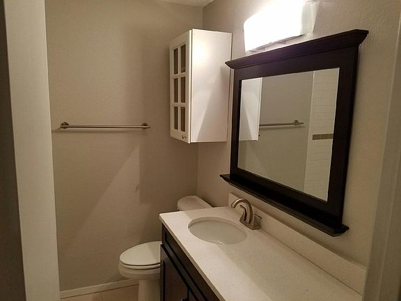 master renovated bathrooms with quartz