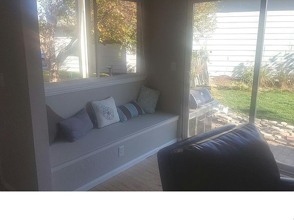 Wonderful window seat with perfect light for reading.