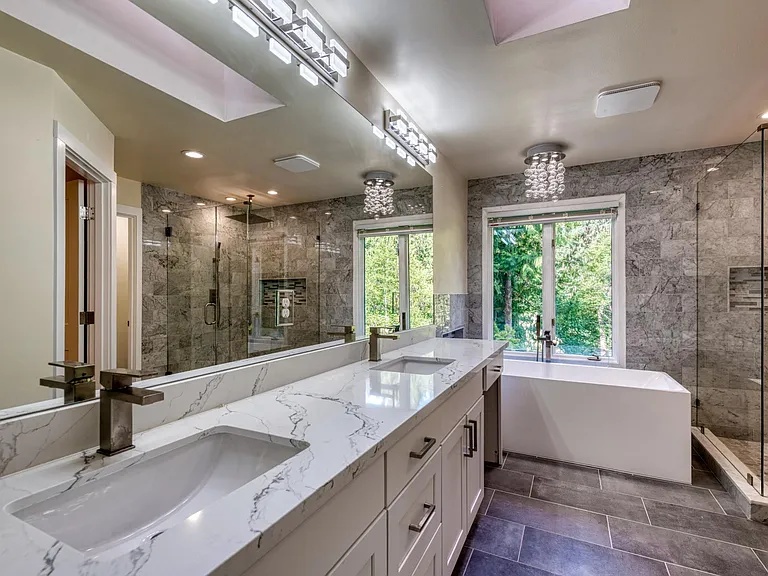 Primary Bathroom Suite with double vanity sinks and make up vanity