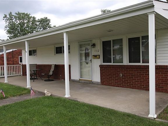Relax on the spacious covered front porch.