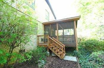 Custom-built, vaulted ceiling screened porch