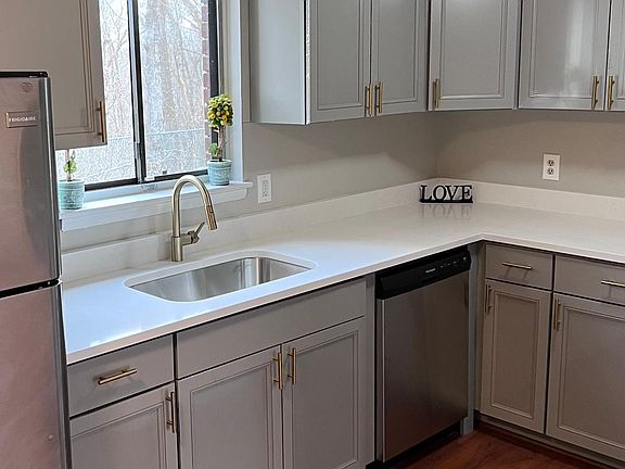 Brand new kitchen cabinets, new quartz countertop, new sink, new faucet
