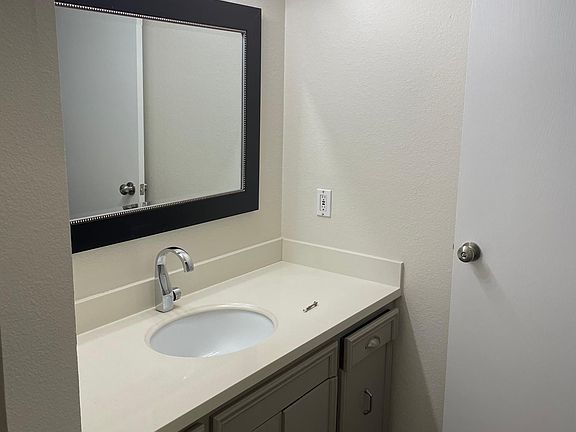 Updated bathroom also accessible from hallway