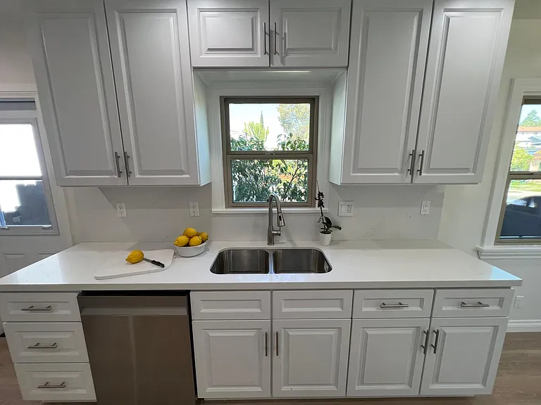 Faucet with Quartz stone counters.
