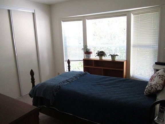 Just wanted you to see the closet size and a different view of the room...it's a good sized room! It holds a bed, dresser, book shelf and end tables with no problem!
