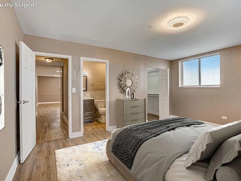 Main Bedroom with Private Bath and Walk-In Closet