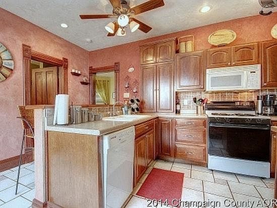 Kitchen - has been repainted a tan color, comes with dishwas
